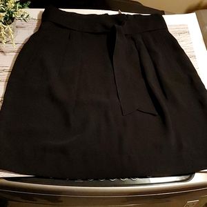 H&M Black Classic Female flowy skirt with zipper and bow size 10